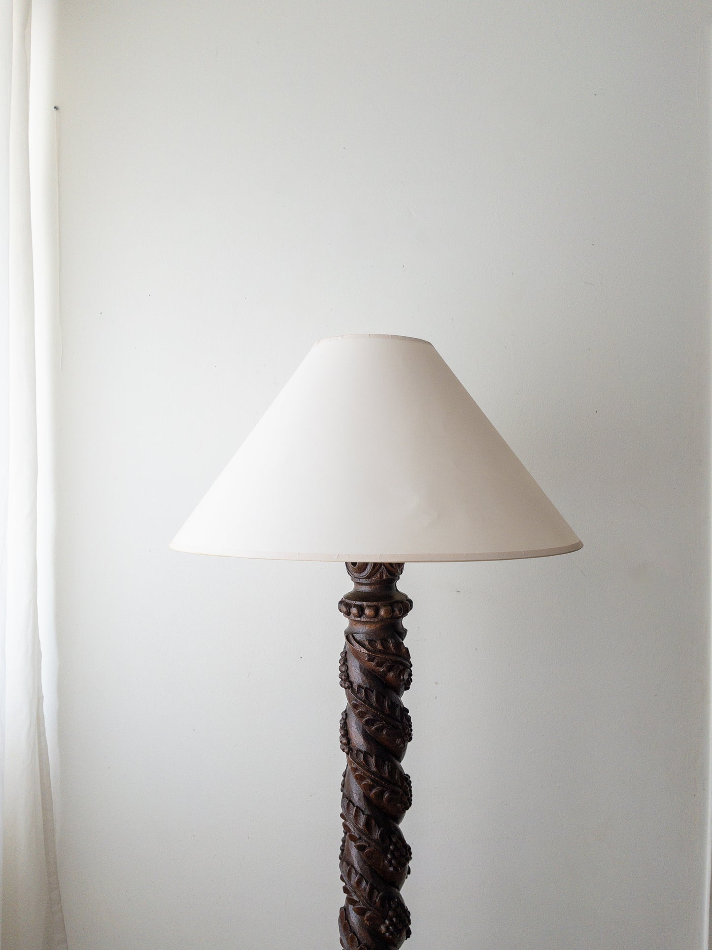 Carved wood floor lamp