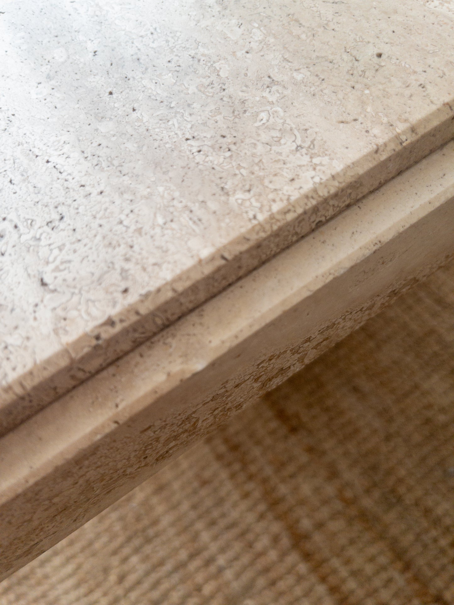 Travertine side table