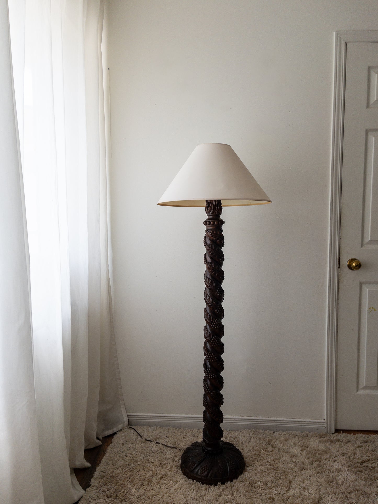 Carved wood floor lamp