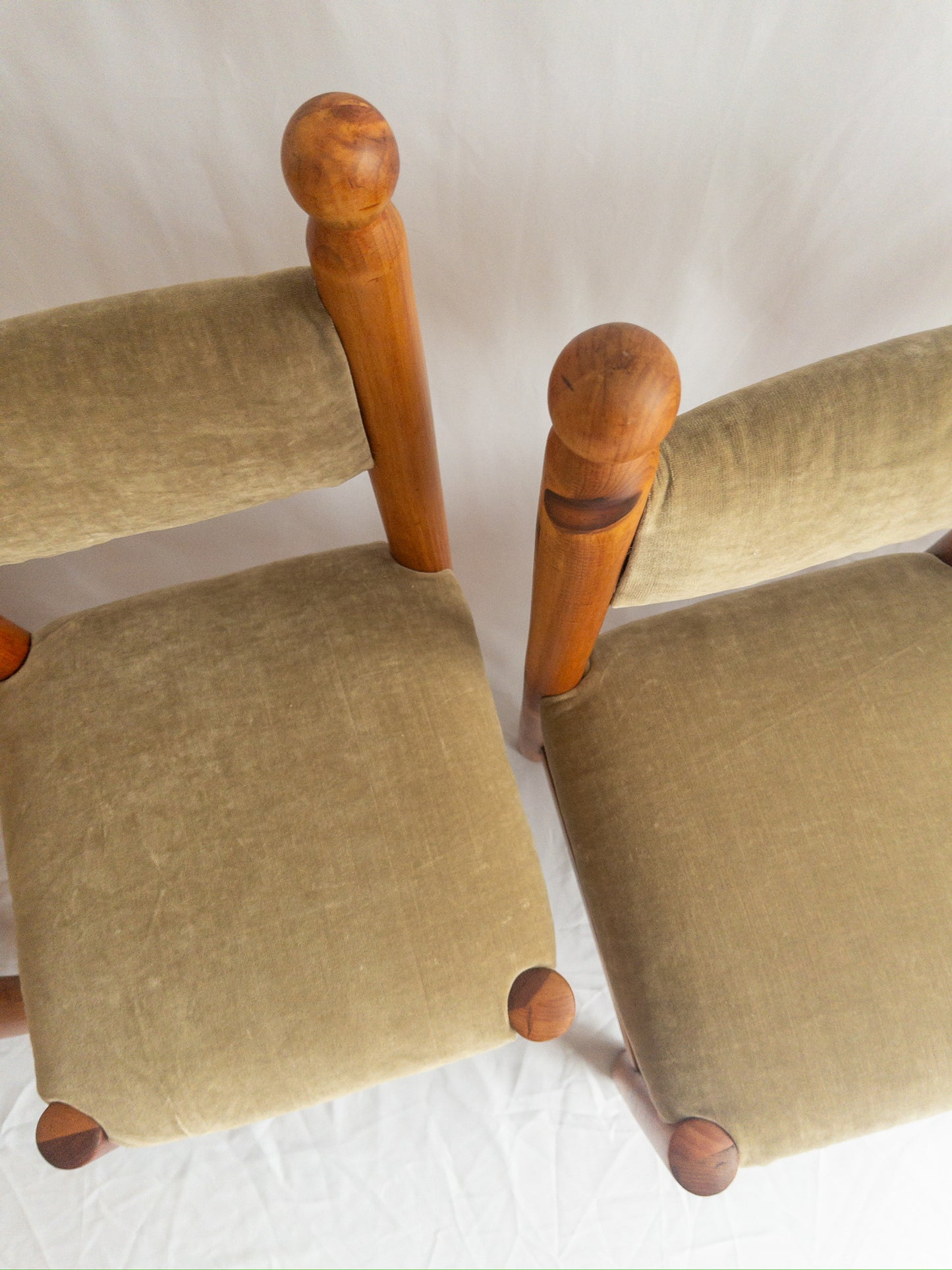 pine and velvet chairs