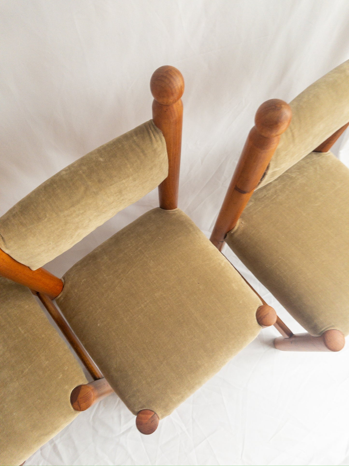 pine and velvet chairs