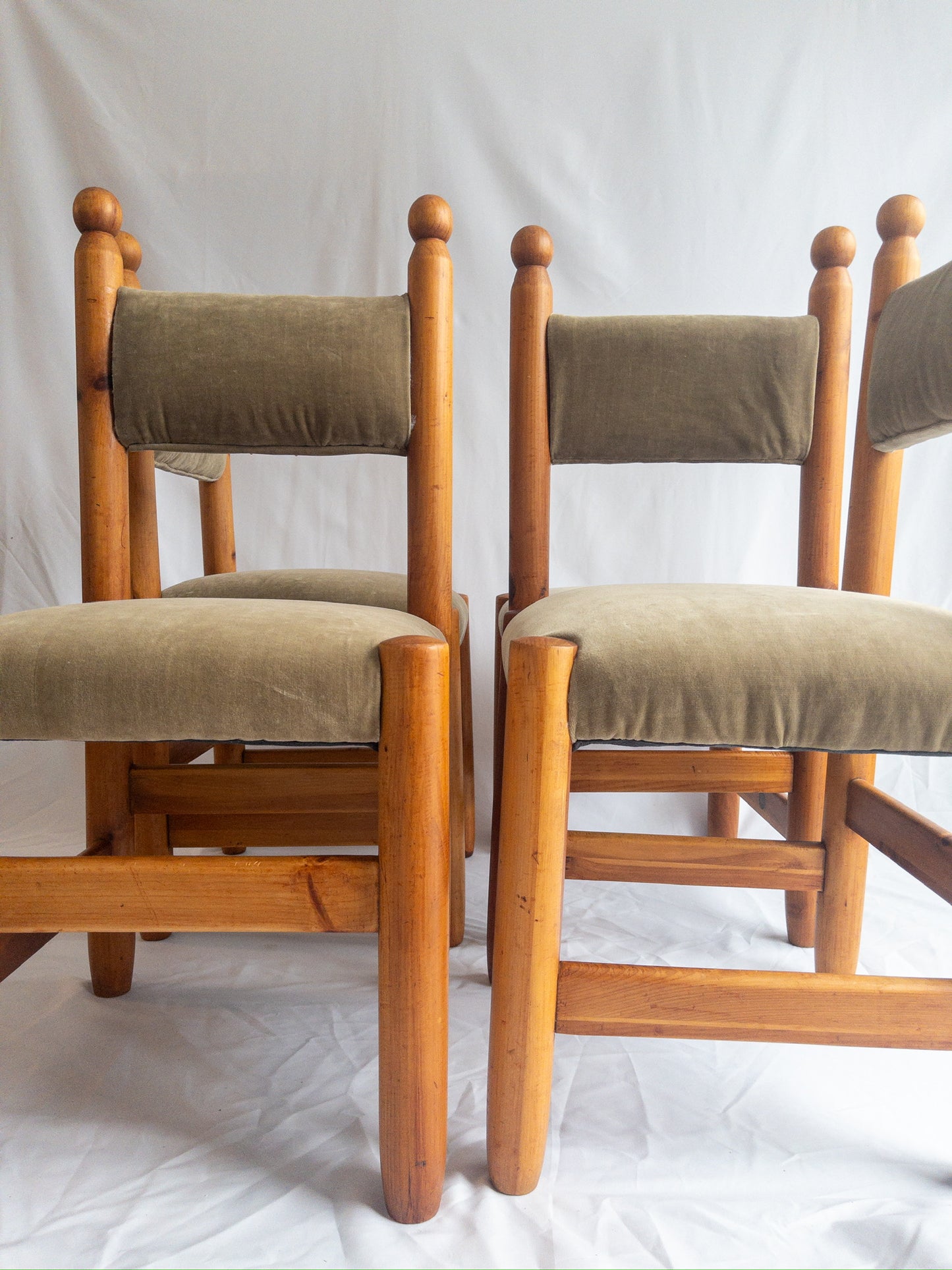 pine and velvet chairs